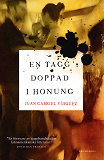 Cover for En tagg doppad i honung